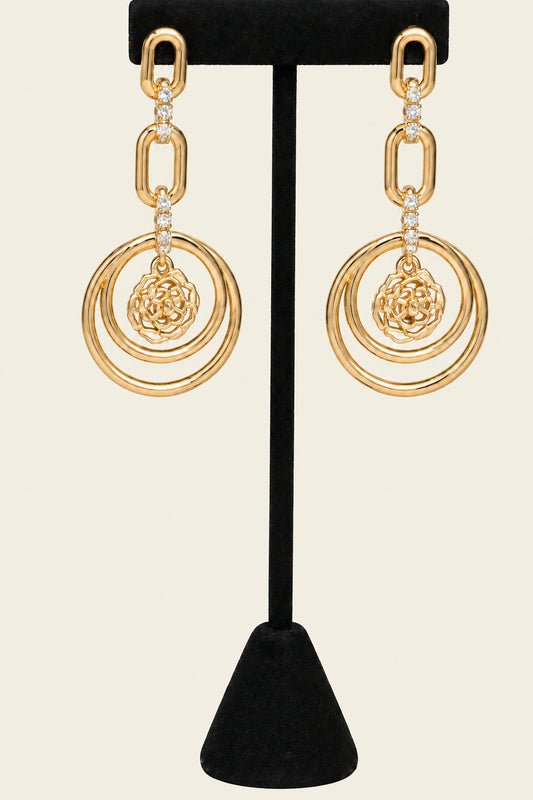 Gold tone crystal rose circle drop earrings