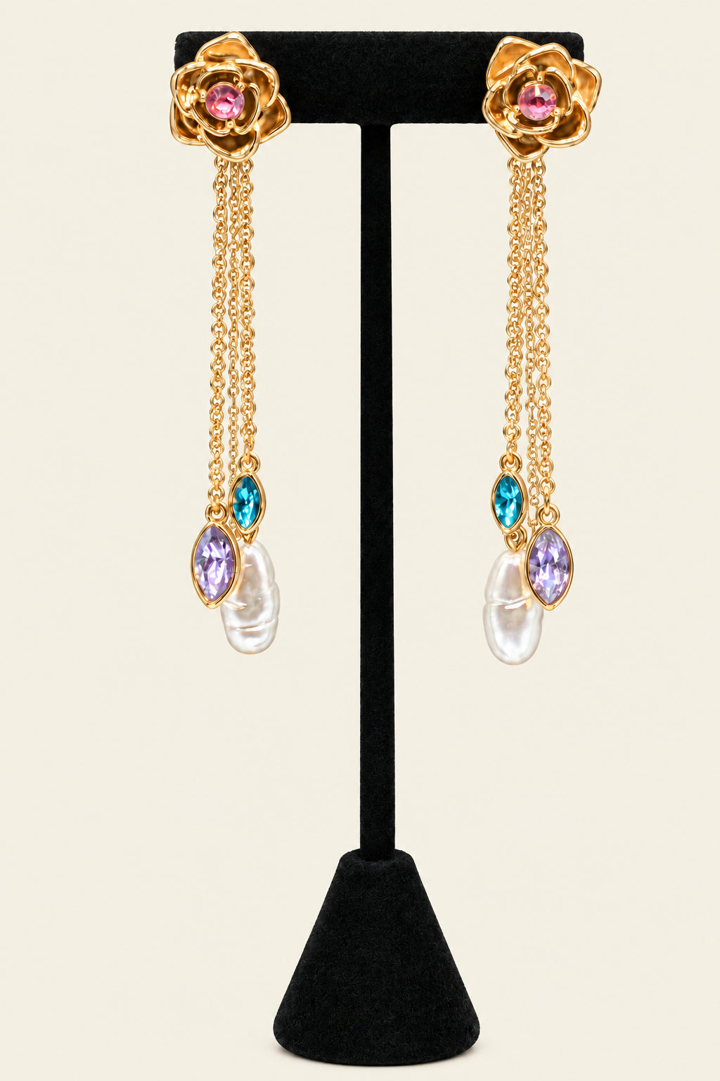 Gold tone pink stone/crystal flower dangling chain with green, blue and pearl stone